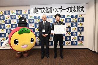 写真:表彰式での坪井選手