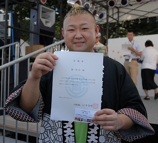 写真：委嘱式の様子