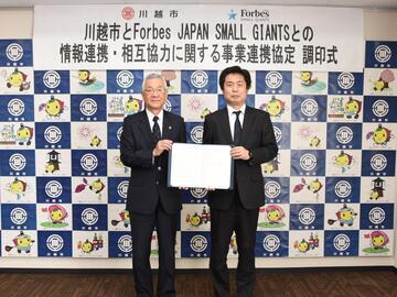 写真:調印式の様子