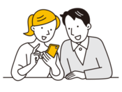 スマホを手にした女性とそれを見ている男性のイラスト