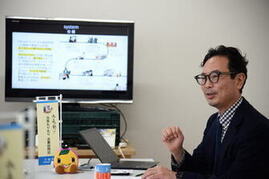 事業説明を行う朝霧社長の写真