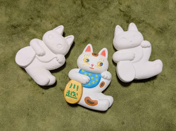 写真：まねきねこ