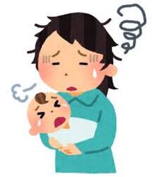 泣いている乳児と疲れている母親